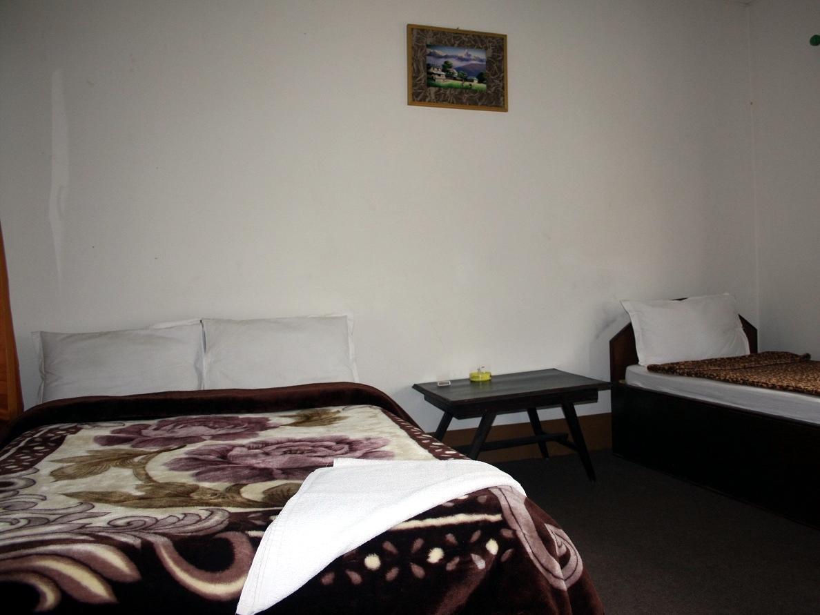 סאורהה Chitwan Safari Camp & Lodge מראה חיצוני תמונה